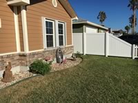 6 foot tall privacy vinyl fence with custom tapered transition