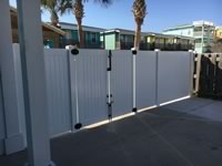 6 foot tall solid vinyl privacy fence with double gates