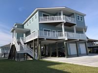 Coastal home outfitted with all vinyl staircase & balcony railing